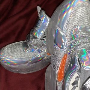 Size 8 women’s reflective sneakers.